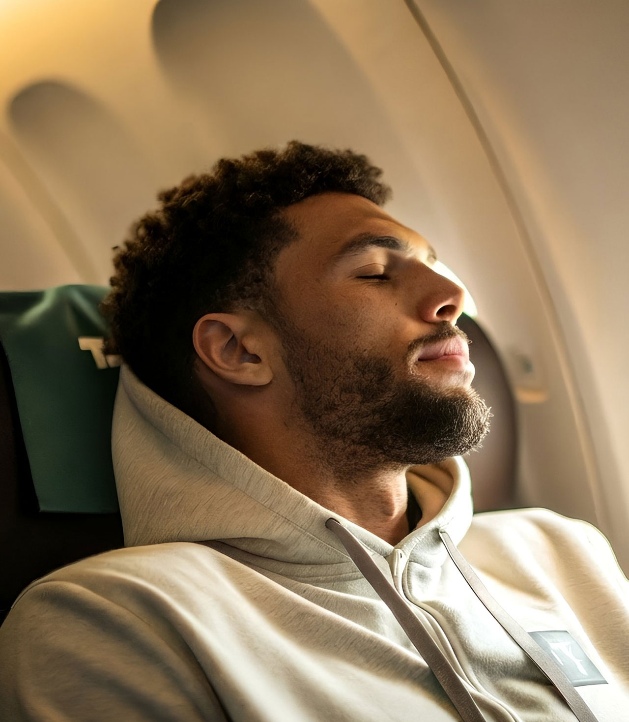 Athlete asleep on the plane